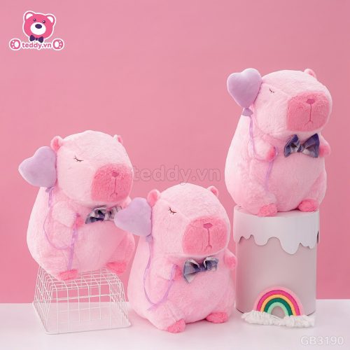 ĐG 40cm Gấu Bông Capybara Hồng Cầm Bóng Tim