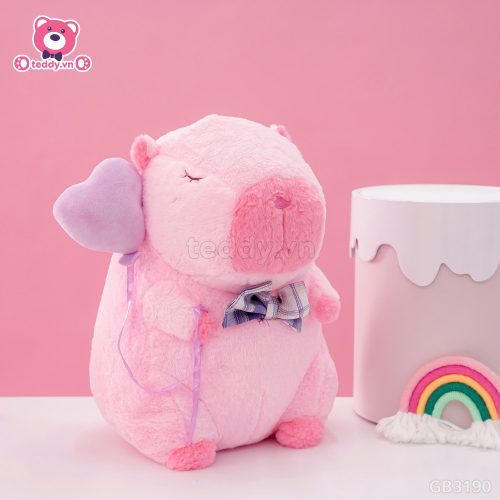 ĐG 40cm Gấu Bông Capybara Hồng Cầm Bóng Tim