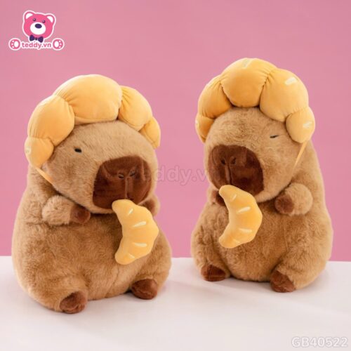 Gấu Bông Capybara Đội Bánh Sừng Bò