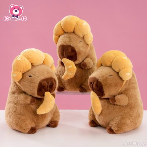 Gấu Bông Capybara Đội Bánh Sừng Bò