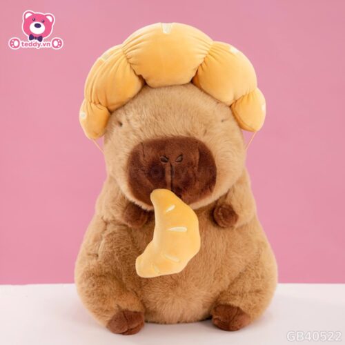 Gấu Bông Capybara Đội Bánh Sừng Bò