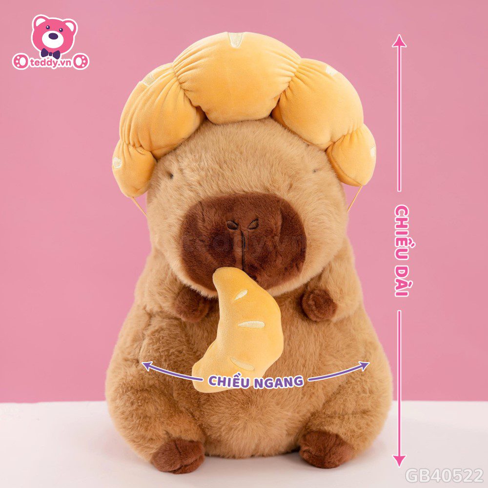 Gấu Bông Capybara Đội Bánh Sừng Bò